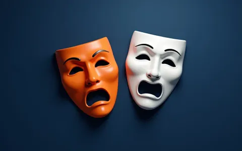 Orange and white 3D theatrical drama masks on deep blue background